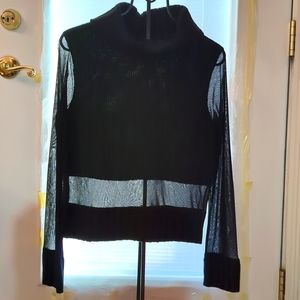 Marshall's long sleeved sheer black acrylic/wool top. The size is L, Knit collar